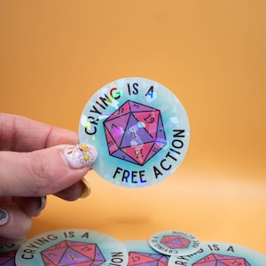 Huilen is een gratis actie - Dungeons and Dragons, D20-sticker, dobbelstenen, nerdy-sticker, BG3, girly-stickers, laptop- en waterflesstickers