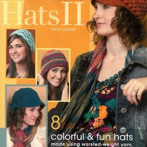 May include: A book cover titled "Hats II" by Sara Dudek, featuring images of crocheted hats. The cover shows a woman wearing a rust-colored crocheted hat. The text reads "hooked on crochet!" and "8 colorful & fun hats."