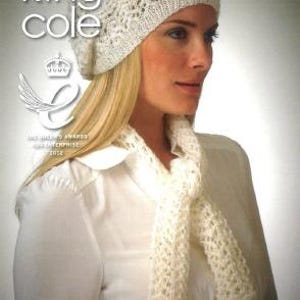 May include: A woman wearing a cream-coloured knitted beret and matching scarf. The beret has an openwork design. The scarf is long and also features an openwork pattern. The image includes the text "KING COLE" and "SET 2".