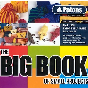 May include: A book cover titled "THE BIG BOOK OF SMALL PROJECTS" with various knitted items. The book features a Patons logo and text: "74 options for small projects - illustrated with numerous ideas for trimming and decoration."