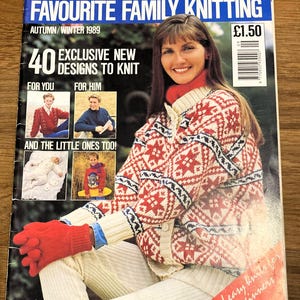 May include: A Woman's Weekly Favourite Family Knitting magazine from Autumn/Winter 1989. The cover features a person wearing a red and white patterned knit cardigan, red gloves, and white pants, with text including 40 Exclusive New Designs.