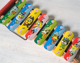 Xilófono de juguete vintage con animales, hojalata litografiada, Japón