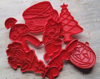 7 Vintage Red Plastic Holiday Cookie Cutters Christmas Halloween Easter Pig