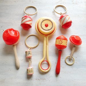 7 Vintage Celluloid Plastic Baby Rattle Toy Lot
