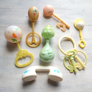 7 Vintage Plastic Baby Rattle Toys Keys Telephone Lot