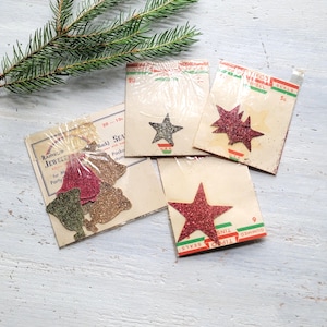 Vintage Tipco zilver glitter klatergoud sterren bells cadeauverpakking zeehonden pakketten