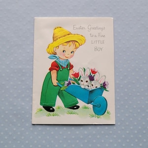 Ragazzo d'epoca con coniglietti in carriola Biglietto di auguri di Pasqua Saluti gentili