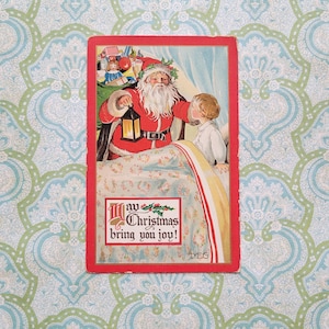 Antike Weihnachtsmann mit Kind im Bett Weihnachtspostkarte Tuck's