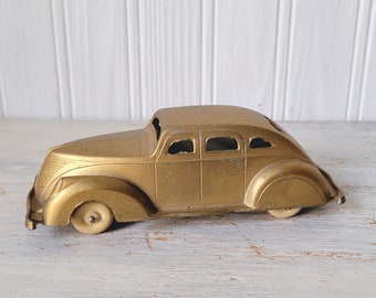 Vintage 1930's Gold Diecast Parker ERIE Toy Coupe Car Rubber Wheels