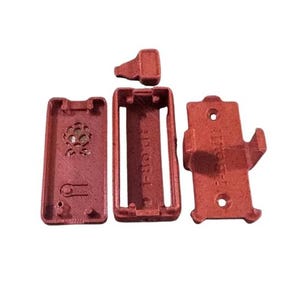 May include: A disassembled red plastic electronic device case, with several components laid out. The parts include a rectangular frame, a cover with a circular design, and a small rectangular piece. The text "IVOR-I" is visible.