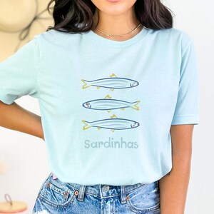 With a fun and ocean aesthetic design, this funny fish tee makes a great girls' weekend tee, vacation outfit, or everyday coastal shirt.