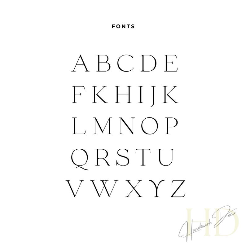 May include: A white background with the word "FONTS" at the top. Below, the alphabet is displayed in a serif font, from A to Z, in a clean, minimalist style. The bottom right corner features a signature.