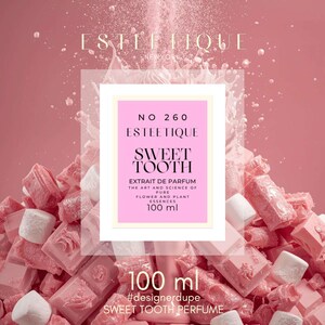 May include: A pink perfume bottle with the text "Sweet Tooth" and "Estetique" is surrounded by pink candies and marshmallows. The bottle is labeled "No 260" and contains 100 ml of perfume. The background is a gradient of pink.
