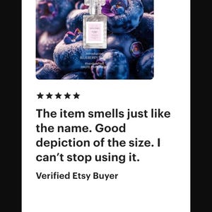 May include: A perfume bottle with a clear cap and a pink label is set against a backdrop of blueberries and purple flowers. The label reads "Sweet Potion" and "Blueberry Sugar". The image includes a customer review.