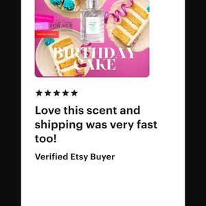 May include: An image featuring a perfume bottle next to a cake slice with the words "BIRTHDAY CAKE". The perfume bottle is clear with a white label. The cake has yellow layers and blue decorations.