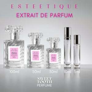 May include: A collection of clear glass perfume bottles with crystal-like stoppers. The bottles are labeled with "Sweet Tooth Perfume" and sizes ranging from 5ml to 100ml. The text "ESTEETIQUE EXTRAIT DE PARFUM" is displayed above.