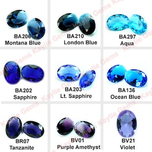 May include: An assortment of oval gemstones in shades of blue and purple. The image features gemstones labelled "Montana Blue", "London Blue", "Aqua", "Sapphire", "Lt. Sapphire", "Ocean Blue", "Tanzanite", "Purple Amethyst", and "Violet".