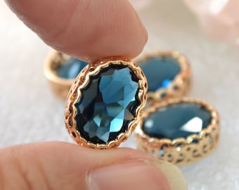 Montana Blue 14x10 Oval Glass Jewel Set in Filigree Light Gold Setting