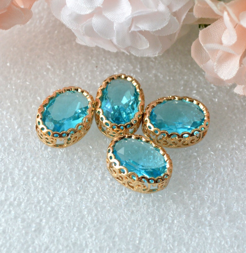 Aqua Blue 14x10 Oval Glass Jewel Set in Filigree Light Gold Setting image 2