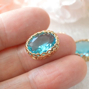 Aqua Blue 14x10 Oval Glass Jewel Set in Filigree Light Gold Setting image 1