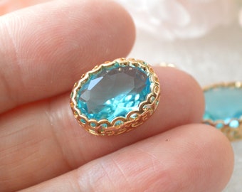 Aqua Blue 14x10 Oval Glass Jewel Set in Filigree Light Gold Setting