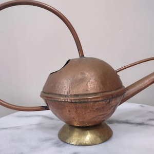 Antique arts and crafts copper and brass watering can