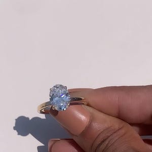 2.31 Carat Oval Lab Grown Diamond Hidden Halo Engagement Ring