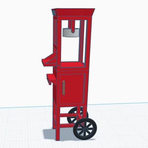 Puede incluir: Un carrito de palomitas rojo con ruedas negras. El carrito tiene un diseño alto y rectangular con una pequeña puerta y un área de servicio. Un recipiente blanco es visible en la parte superior. El carrito está diseñado para parecerse a una máquina de palomitas clásica.