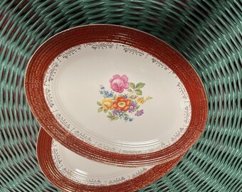 Two Leigh Ware large oval platters.