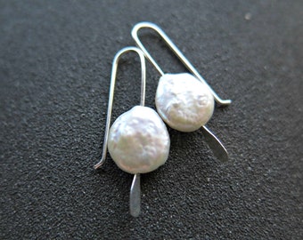 small white coin pearl earrings. white pearl jewelry. modern pearl jewellery.