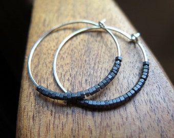 black hoop earrings. hammered silver hoops. geometric jewelry. simple hematite hoops.