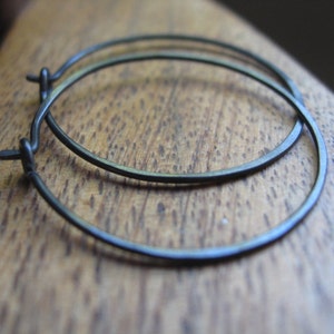 hypoallergenic black hoop earrings. anodized niobium jewelry. 1 inch hoops. nickel free jewellery. Made in Canada.