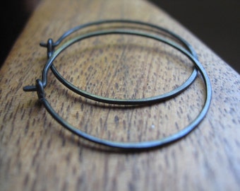 hypoallergenic black hoop earrings. anodized niobium jewelry. 1 inch hoops. nickel free jewellery. Made in Canada.