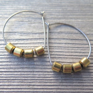 hypoallergenic hoop earrings. silver and gold jewelry. niobium earwires. sensitive ears. image 5