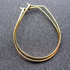 yellow gold earrings in niobium wire. hoop earrings. hypoallergenic jewelry, splurge. image 1