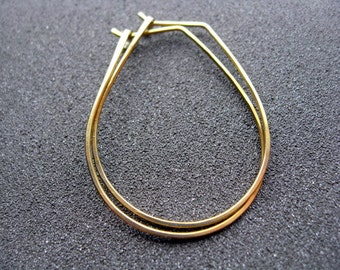 yellow gold earrings in niobium wire. hoop earrings. hypoallergenic jewelry, splurge.