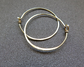 yellow gold niobium hoops. 1 inch hoop earrings. anodized jewelry. made in Calgary, Alberta.