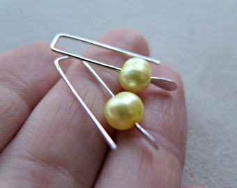 small yellow pearl earrings. lemon yellow freshwater pearls on silver plated earwires. simple pearl jewelry. made in Calgary Alberta