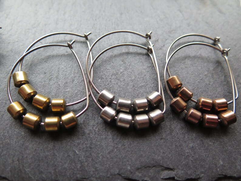 hypoallergenic hoop earrings. silver and gold jewelry. niobium earwires. sensitive ears. image 8