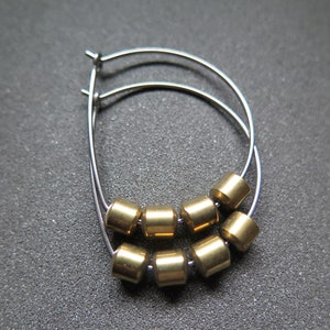 hypoallergenic hoop earrings. silver and gold jewelry. niobium earwires. sensitive ears. image 6