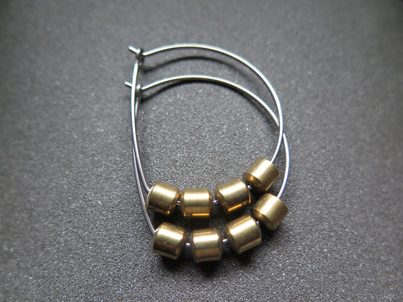 hypoallergenic hoop earrings. silver and gold jewelry. niobium earwires. sensitive ears. image 6
