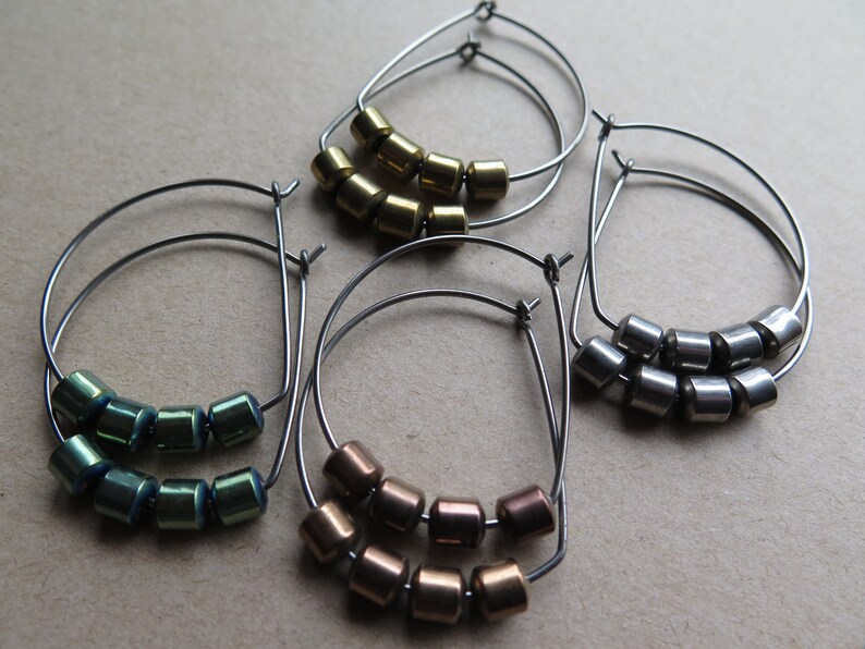 hypoallergenic hoop earrings. silver and gold jewelry. niobium earwires. sensitive ears. image 9