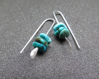 small turquoise earrings. natural turquoise stones. small silver earings. made in Canada