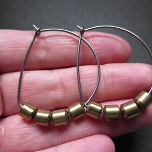 hypoallergenic hoop earrings. silver and gold jewelry. niobium earwires. sensitive ears. image 7