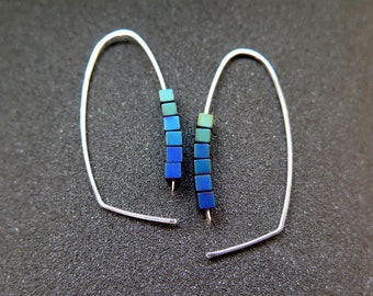 peacock jewelry. hematite earrings. indigo, blue and green hoops.