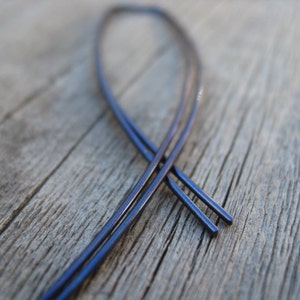 denim blue earrings. niobium jewelry. geometric hoops. splurge image 1