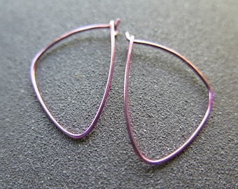 small pink hoop earrings. anodized niobium hoops. modern earrings for sensitive ears.