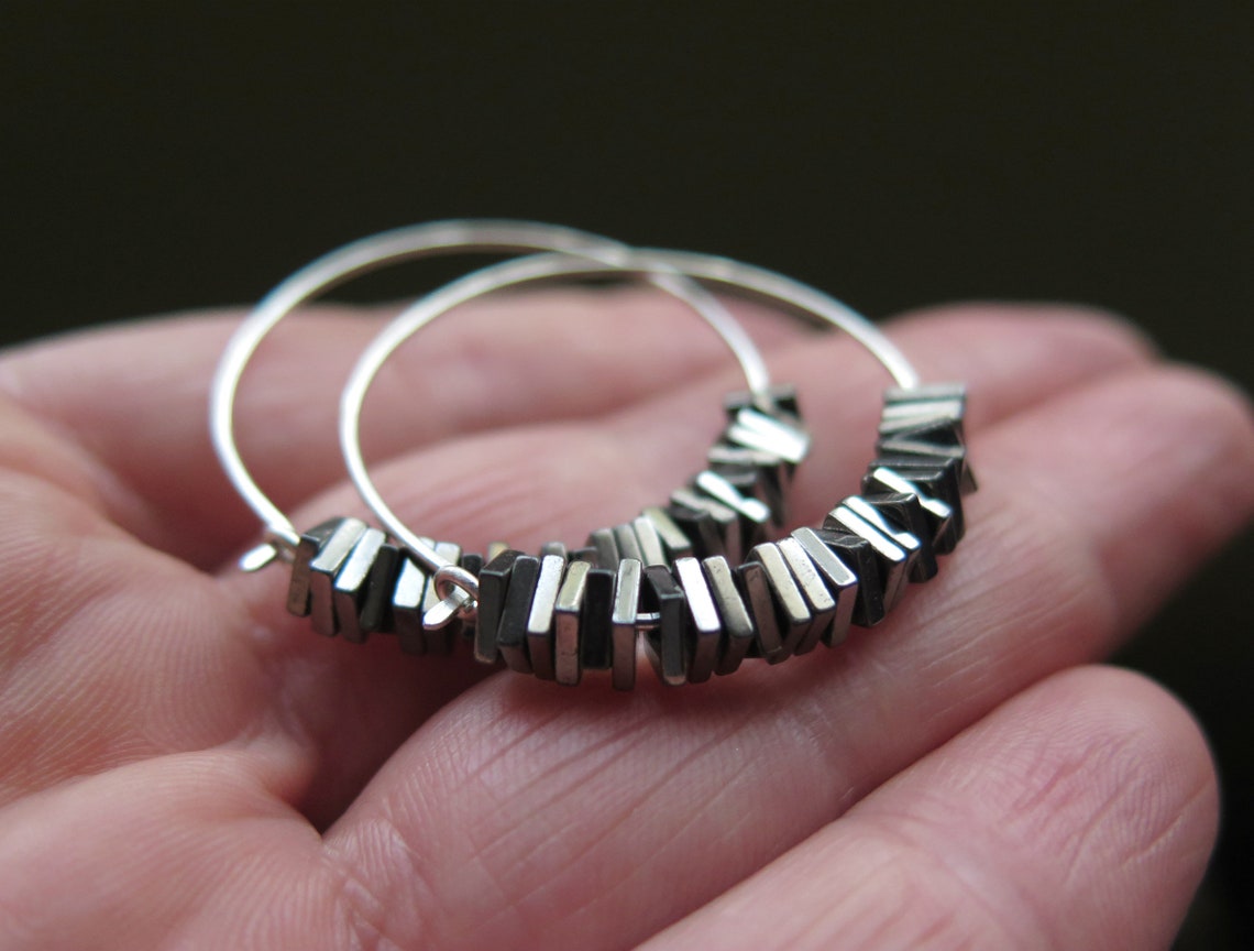Izzy hematite and brass hoop earrings main image 1