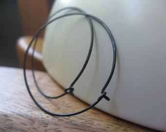 black hoop earrings. hammered niobium hoops. hypoallergenic jewelry. made in Calgary, Alberta.