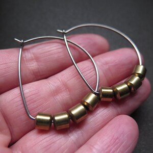 hypoallergenic hoop earrings. silver and gold jewelry. niobium earwires. sensitive ears. image 2